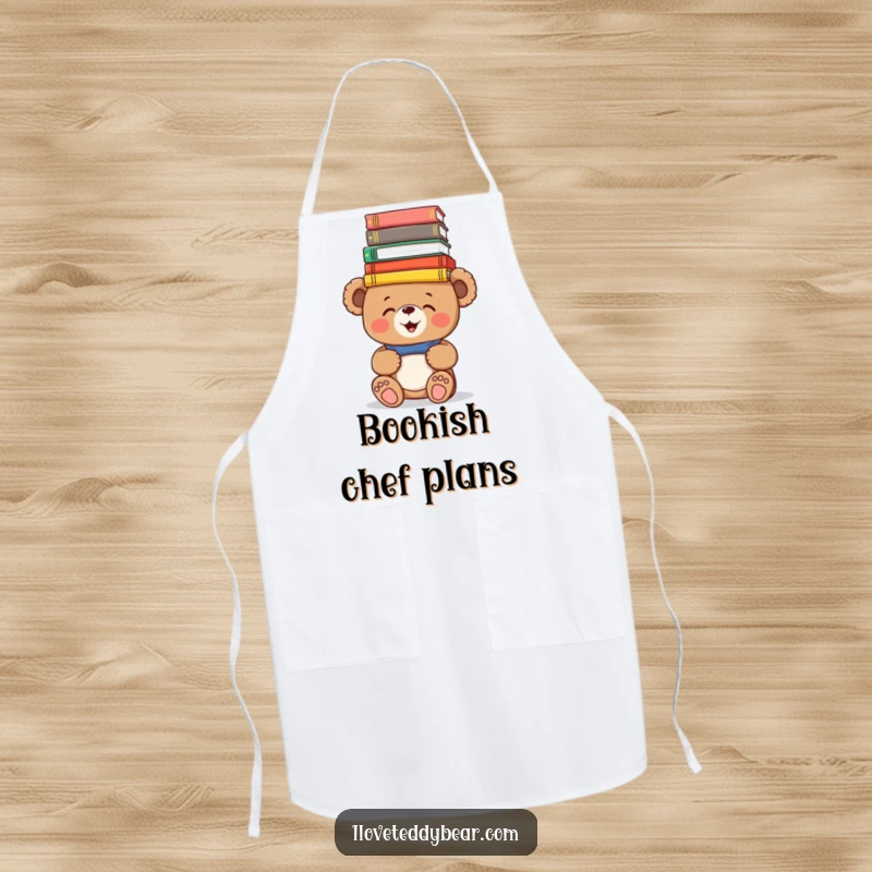 Funny Apron: A giggling teddy bear humorously balances colorful books on its head while in the kitchen, blending culinary and literary fun.