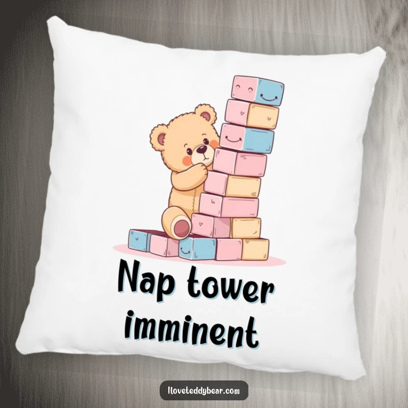 Funny teddy bear pillow featuring a bear precariously stacking blocks, a humorous depiction of effort and potential collapse.