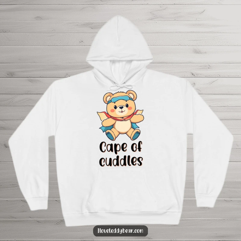 Funny hoodie with a brave teddy bear superhero in mid-flight, cape billowing, ready to embark on daring missions with heroic charm.