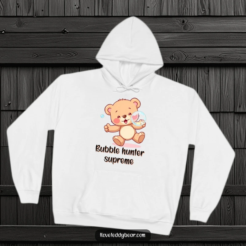 Funny Hoodie illustration of a happy teddy bear joyfully pursuing a big, iridescent bubble, symbolizing carefree fun and playful energy.