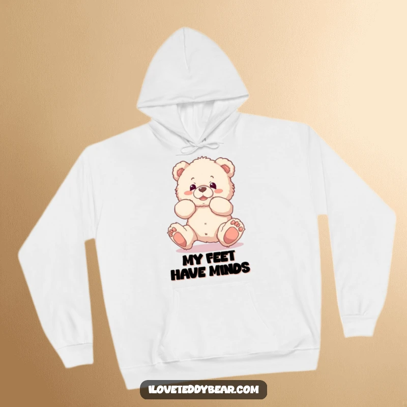 Funny hoodie featuring a fluffy teddy bear comically tripping over its own feet, perfect for cozying up with a smile.