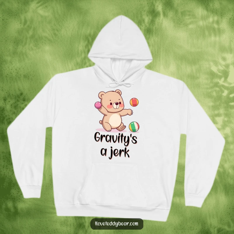 Funny hoodie depicting a bear unsuccessfully juggling three bright balls, one falling, a cozy and humorous apparel choice.