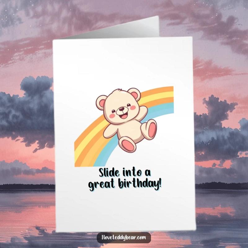 Funny Free Printable Birthday Card: A happy teddy bear slides down a vibrant rainbow with an enormous grin, spreading cheer.