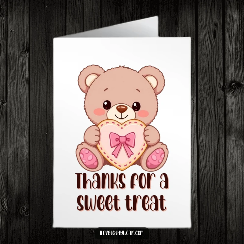 Funny Free Printable Thank You Card of a teddy bear proudly holding a heart-shaped cookie with a ribbon.