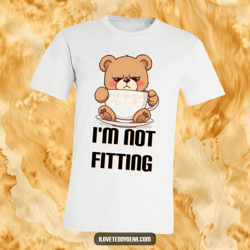 Funny t-shirt depicting a grumpy teddy bear stuffed into a tiny teacup, showing humorous disbelief and struggle. Ideal funny gift.
