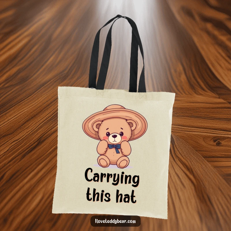 Funny Tote Bag depicting a charming teddy bear comically attempting to don a ridiculously large and floppy hat, perfect for a good laugh.